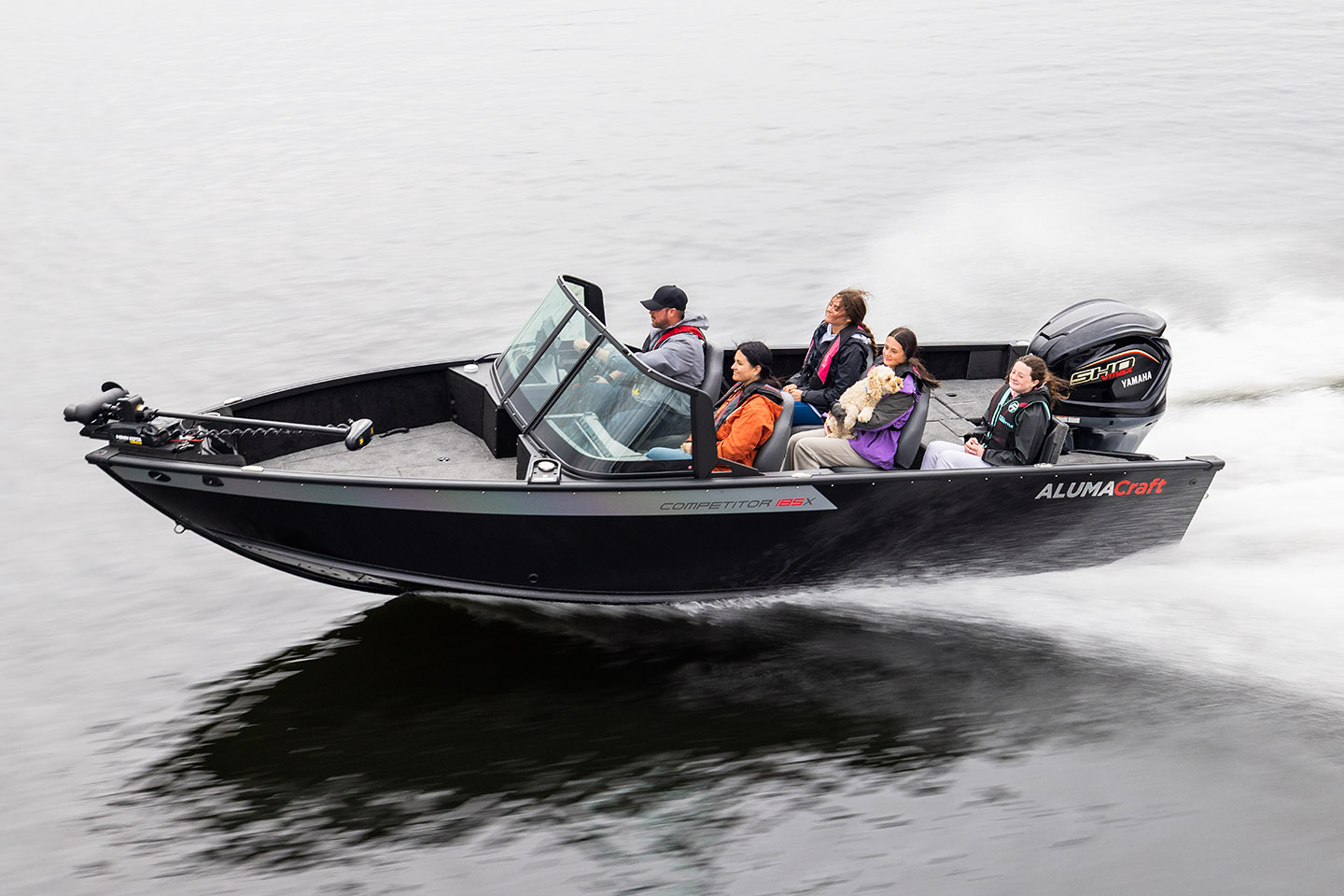 Jay Siemens fishing from his Alumacraft on lake 